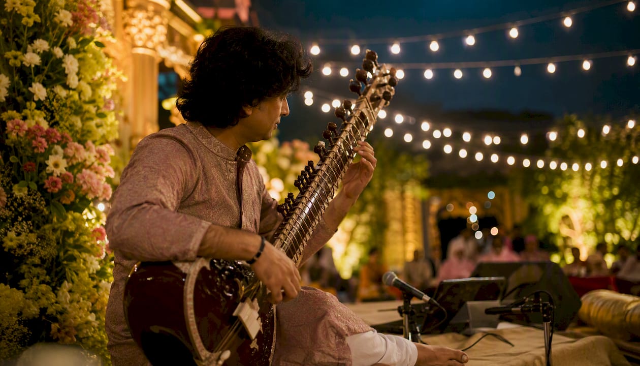 Rajib Karmakar sitarrajib Sitar for Sangeet: Your Complete Booking Guide 1 Sitarist performing at elegant sangeet event