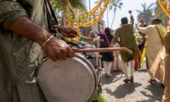 Rajib Karmakar sitarrajib Baraat Music Ideas: High-Energy Playlists & DJ Tips 1 Dhol player drumming at baraat procession