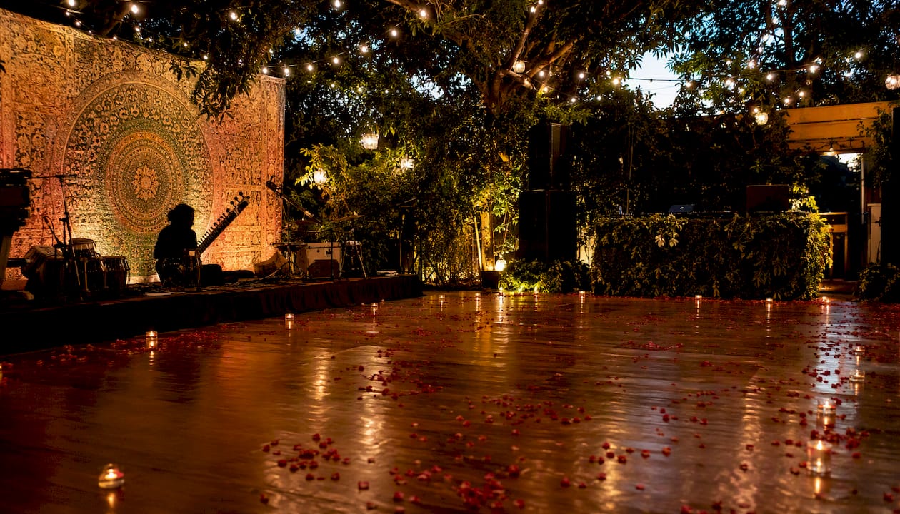 Rajib Karmakar sitarrajib Live Band vs DJ: What Couples Need to Know 1 Wedding venue with live band and DJ setups