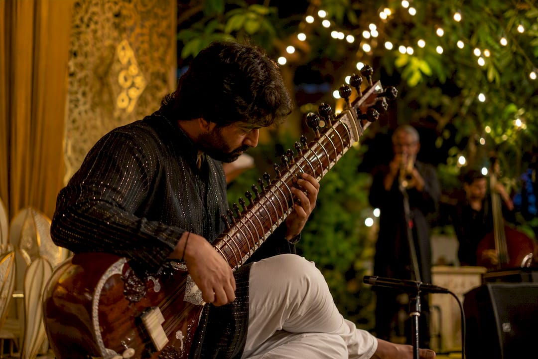 Rajib Karmakar sitarrajib Sitar Jazz Fusion: A Guide for Musicians and Listeners 1 Sitarist playing sitar in jazz fusion concert