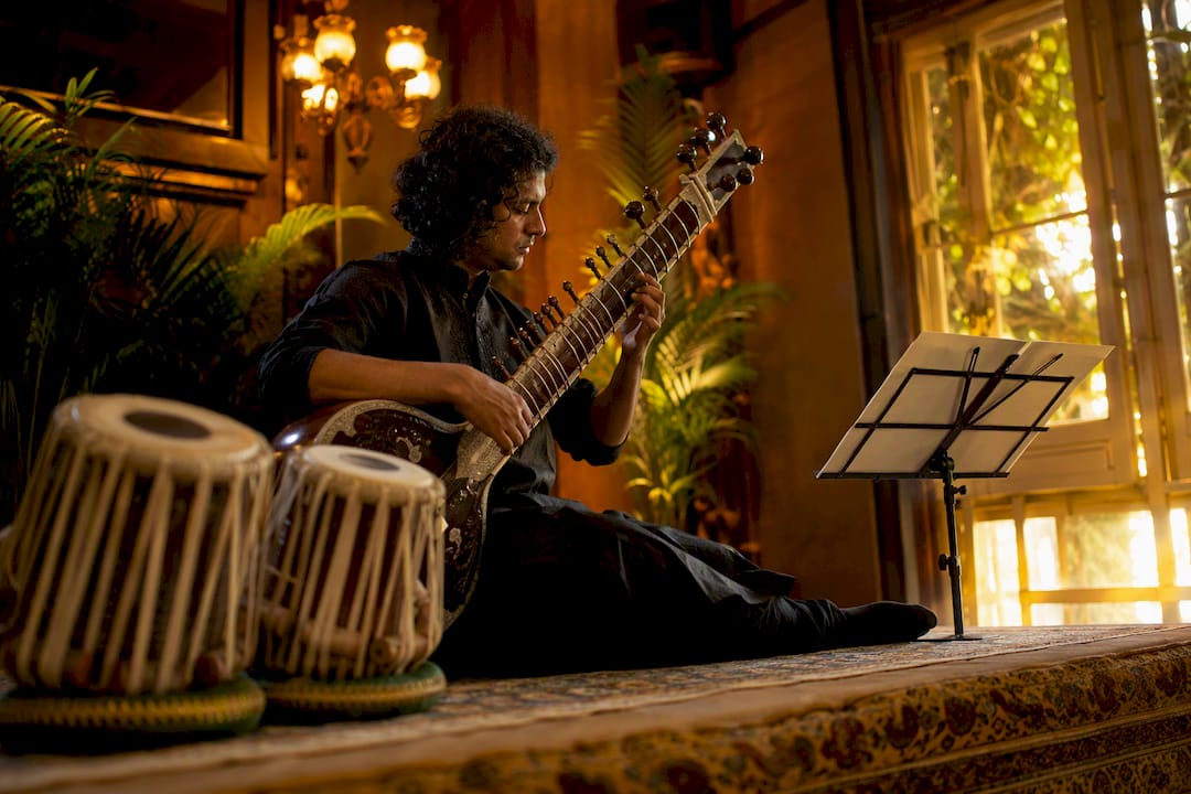 Rajib Karmakar sitarrajib Types of Live Music Acts for Cultural Events: A Planner's Guide 1 Sitarist performing live at cultural event