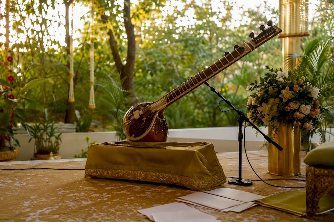 Rajib Karmakar sitarrajib The Best Award Ceremony Music by Moment and Mood 1 Sitar on stand with microphone at ceremony venue