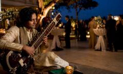 Sitarist performing at an elegant reception