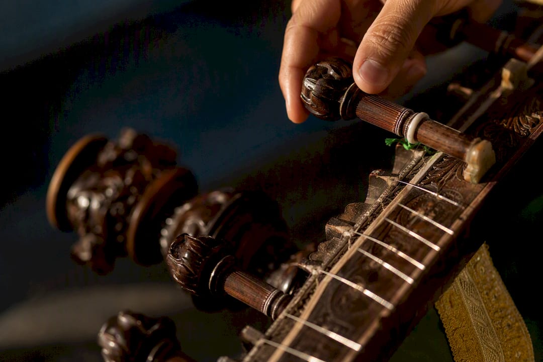 Rajib Karmakar sitarrajib Practice First Sitar Tuning for Beginners: Main Strings and Harmonics 1 Close view of sitar strings being tuned